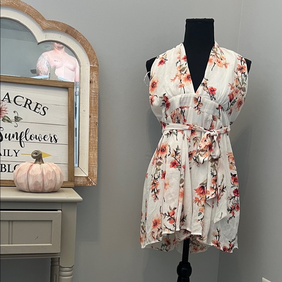 Trendy Boutique Floral Cream and Red Romper - Picture 1 of 6